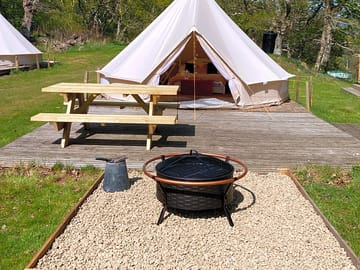 Pink bell tent with deck area