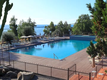 Outdoor pool with loungers