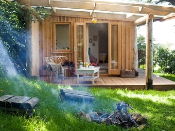 Firepit to enjoy from the cabin veranda
