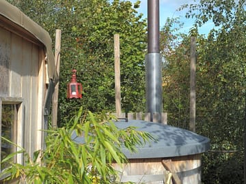The pet-friendly yurts, oak and birch, have wood-fired hot tubs