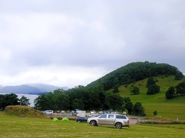 Grass pitches by the lake
