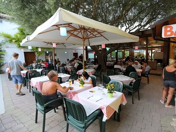Relax with a drink or a meal at the campsite bar