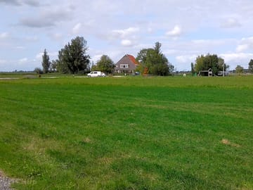 The farm with the pitches on the right