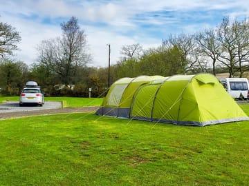 Electric optional grass tent or trailer tent pitch