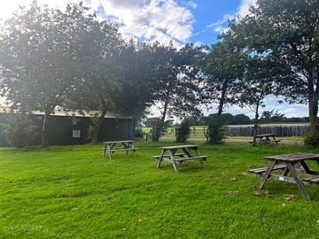 Toilet block and picnic tables