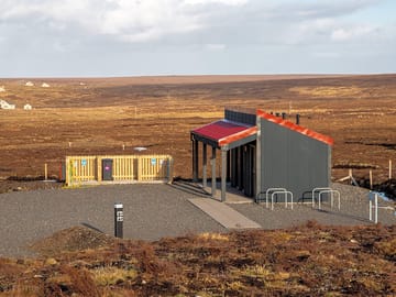 The facility block with moorland backdrop