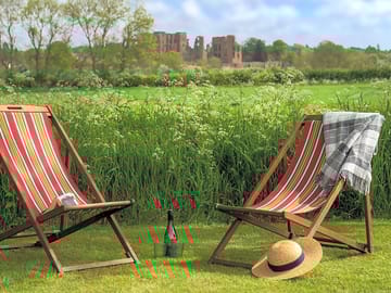 Deckchairs on the lawn with views of kenilworth castle