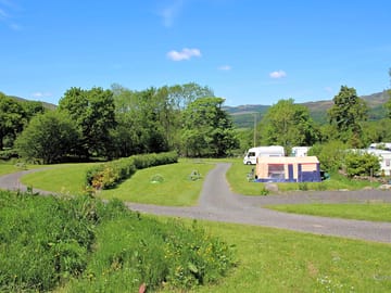 The electric pitches seen from the wild garden