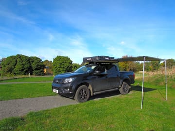 Grass and gravel campervan pitch