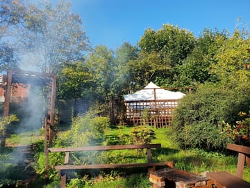 A view of the safari tent from the upper fire pit.