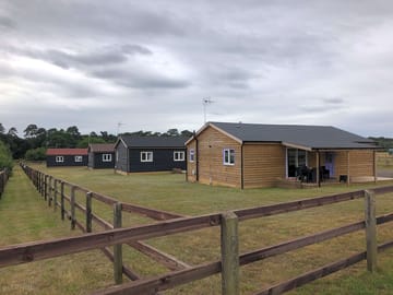 The 4 new lodges backing on to the caravan park