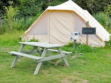 Picnic table outside acorn