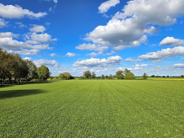 Meadow with views of the countryside