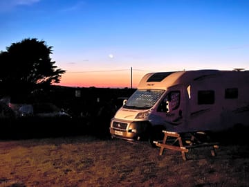 Sunset over roselands caravan and camping field
