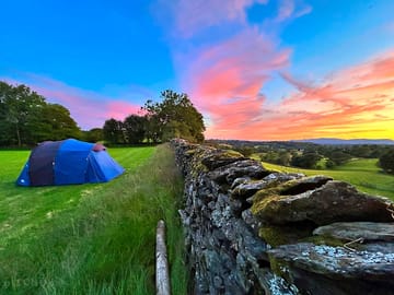 Pitch at boundary wall overlooking the view to the coniston fells