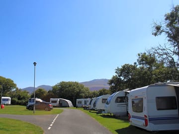 Grass pitches with mountain views