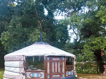 Outdside the white yurt