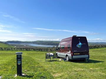 Campervan pitch. the pitches are mostly flat but we would suggest you bring levelling blocks.