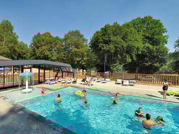 Heated pool with sliding roof