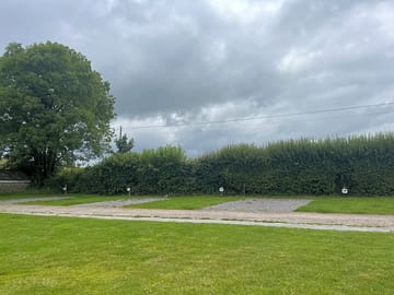 Electric hardstanding and grass motorhome pitch