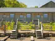 View of stable cabins Lapwing, Linnet and Skylark