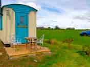 Park next to your hut with neighbours 50-100 metres away