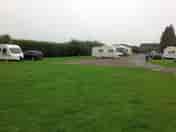 Grass and hard standing, plenty of room August bank holiday
