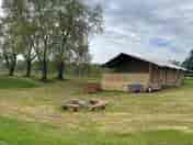 The Birches two-bedroom safari tent with woodfired hot tub and firepit