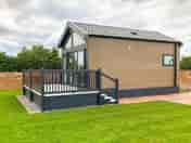 Glamping pod with verandah and private fishing