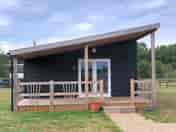 Nightingale Lodge with its private veranda, ideal spot to watch the sunset or star gaze