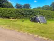 Picnic bench right next the the tent