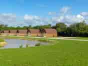 Grass touring/tent pitches by the lake