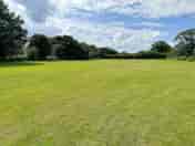 Spacious neatly mown camping field