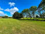 The top half of the camping field, looking out over fields