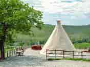 The landscape that can be enjoyed from the tepee is wonderful among the Maremma hills