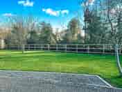 Electric grass tent pitch