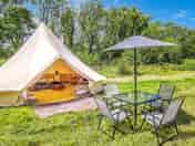 Bell tent with dining area