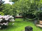 The garden with firepit and hammock