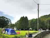 General site and non electric grass pitches in the peaceful village of Llanbedr