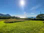Grass pitch with sea views