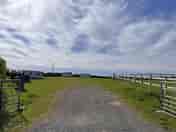 Double-gated site entrance from the road