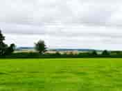 View out onto the field and hills