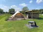 Family Bell Tent with private out door kitchen and fire pit.