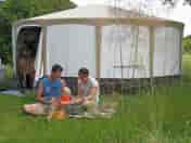 Relaxing family time outside your yurt