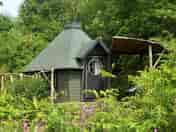 View up to ‘Willow’ Hobbit Hut from one of the ponds