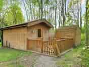 Dog friendly lodge exterior with fence