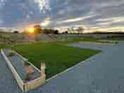 Motorhome pitches at sunset