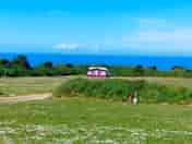 Grassy fields near the coast