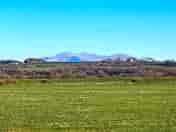 View of Snowdonia from the site