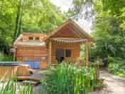 Front view of Tawny cabin with wood fired hot tub